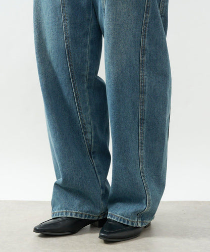 前片拼接弧形牛仔褲