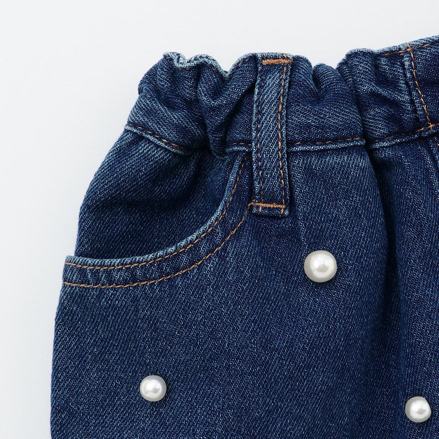 珍珠裝飾牛仔裙褲