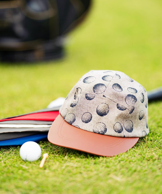 OOPS 仿皮革拼接全印花棒球帽