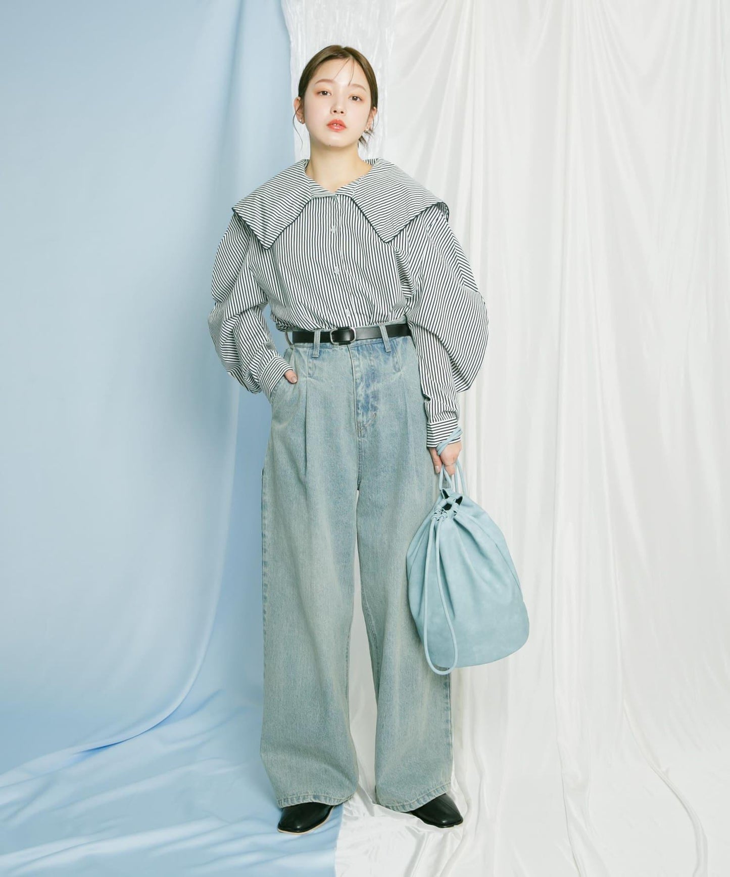 單肩束口包