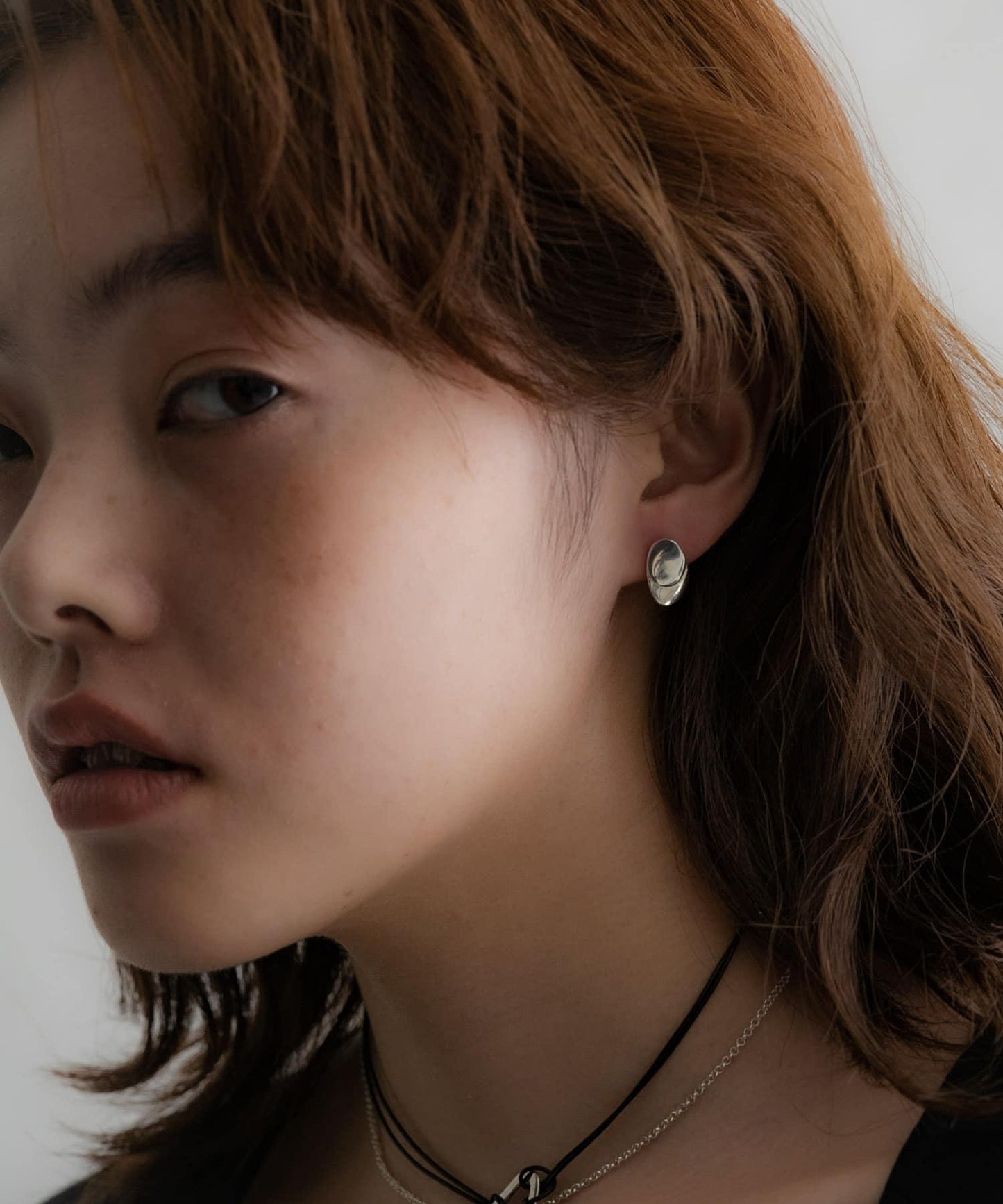 SMELLY so’ 扭紋金屬盤耳釘