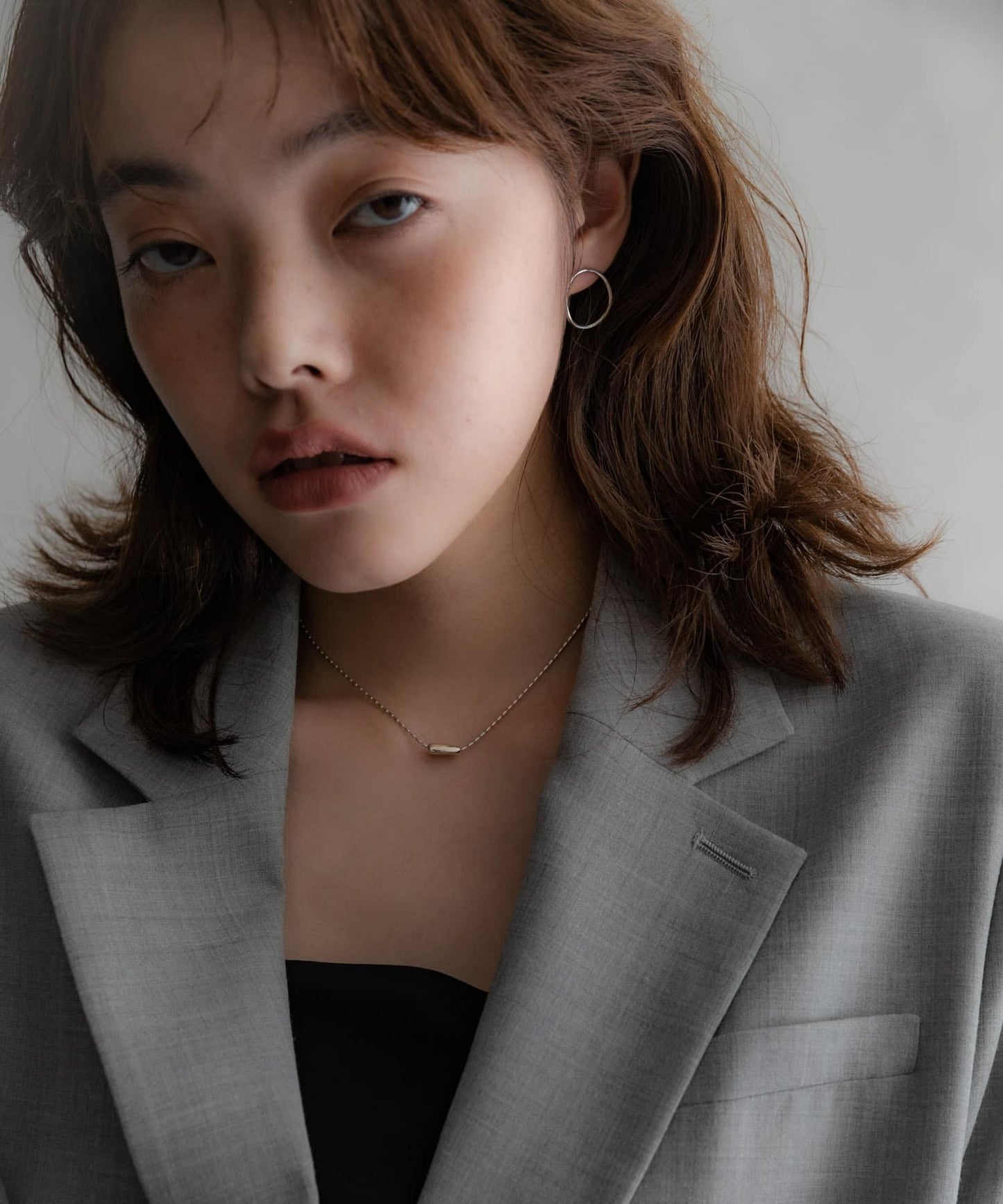 SMELLY so’彎曲圓環耳釘