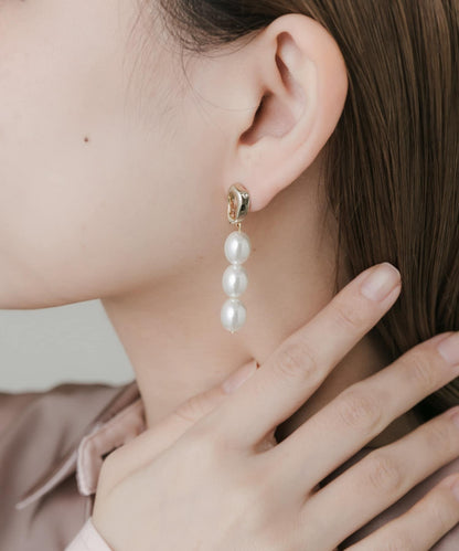 不對稱珍珠流蘇耳環