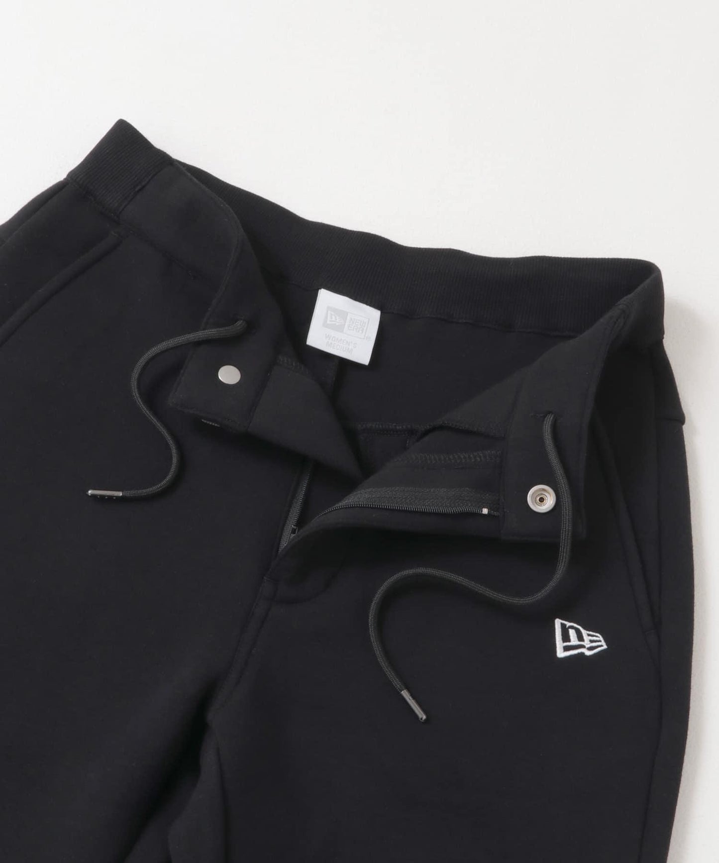 New Era GOLF 彈力運動錐形褲