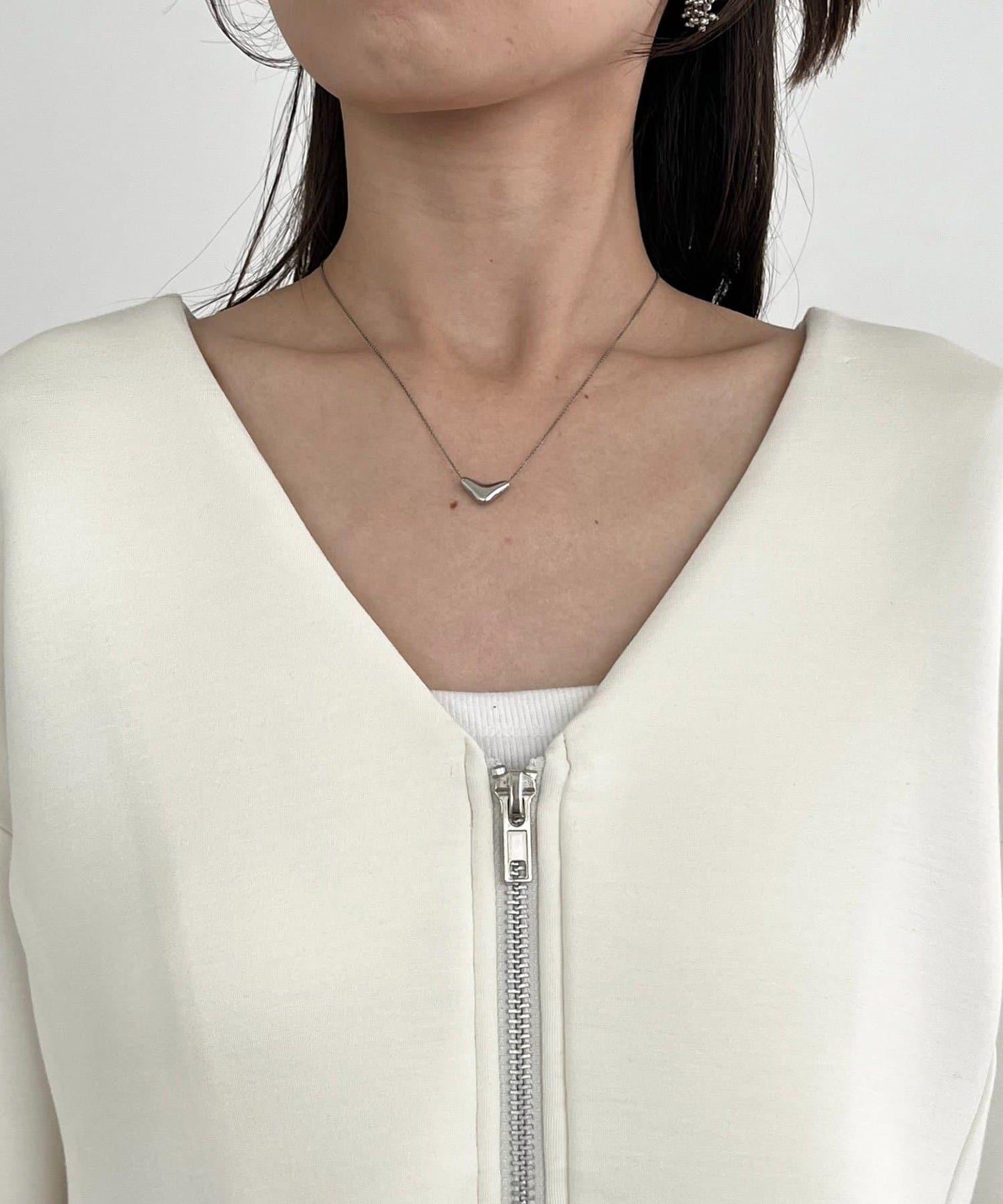 【顯瘦提臀】荷葉邊拉鍊開衫