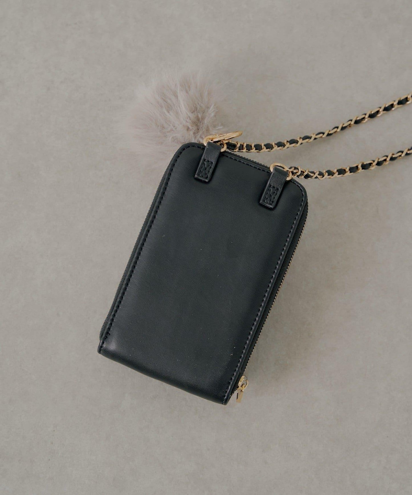 帶毛球掛飾絎縫手機包