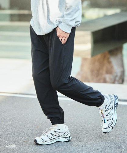 全氣候運動服 可收納輕便休閒束腳褲