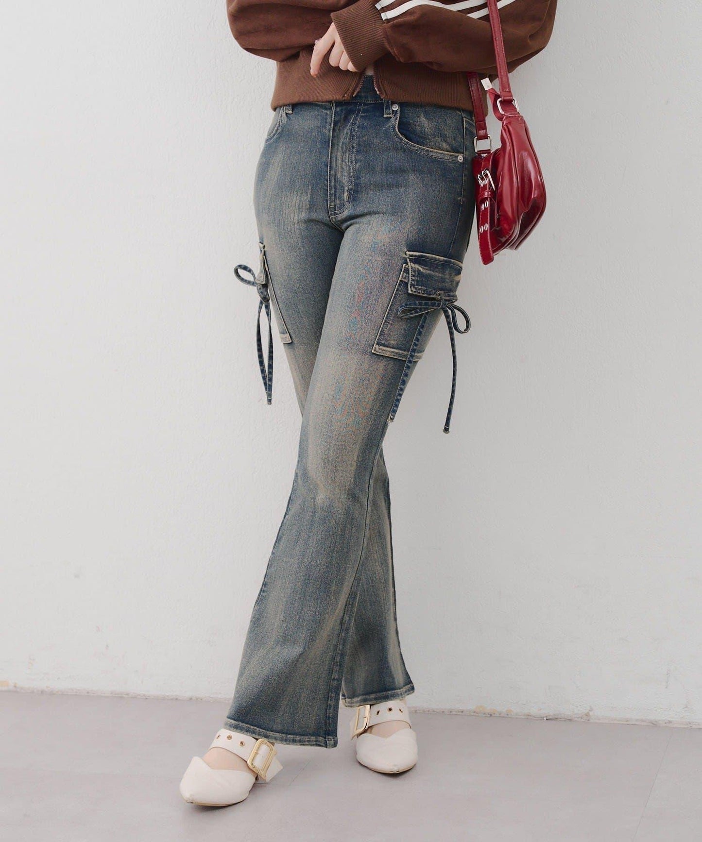 蝴蝶結工裝牛仔喇叭褲