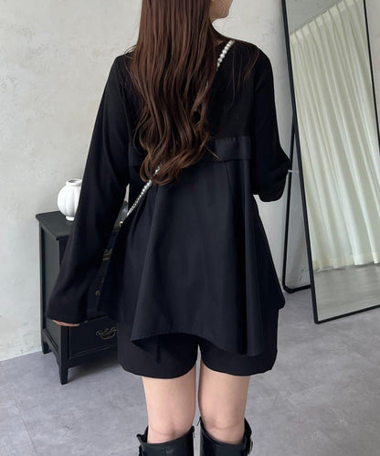 不規則下襬荷葉邊拼接A字羅紋長袖T恤