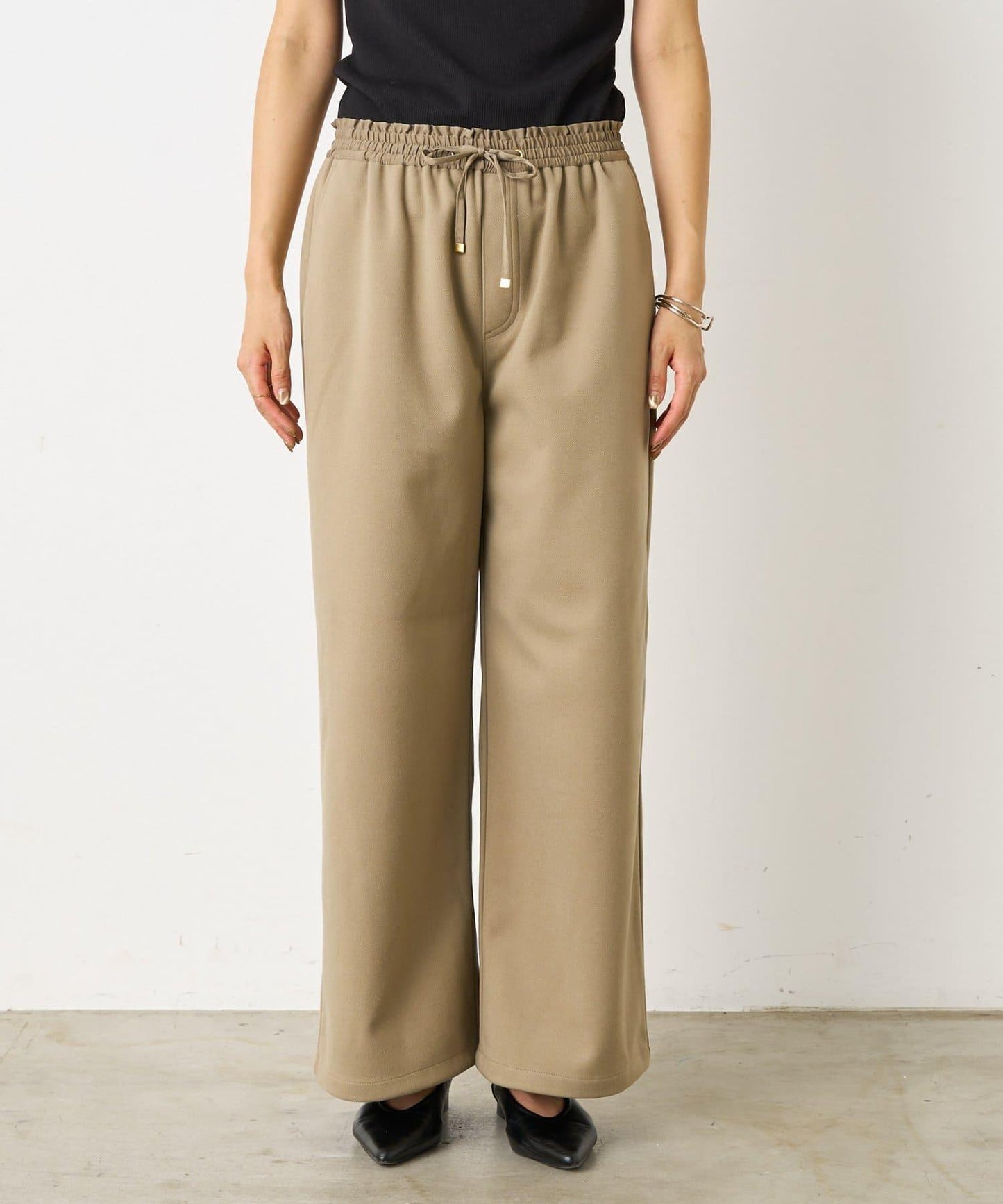 暖感緞面拼接休閒褲