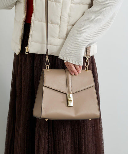 扭扣金屬單手柄波士頓包