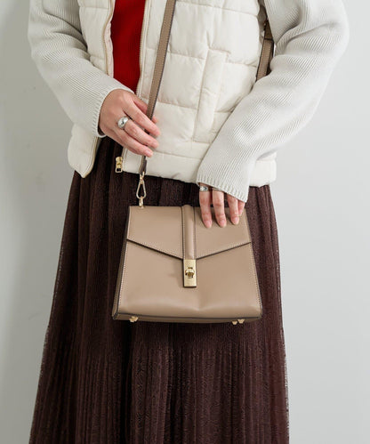 扭扣金屬單手柄波士頓包