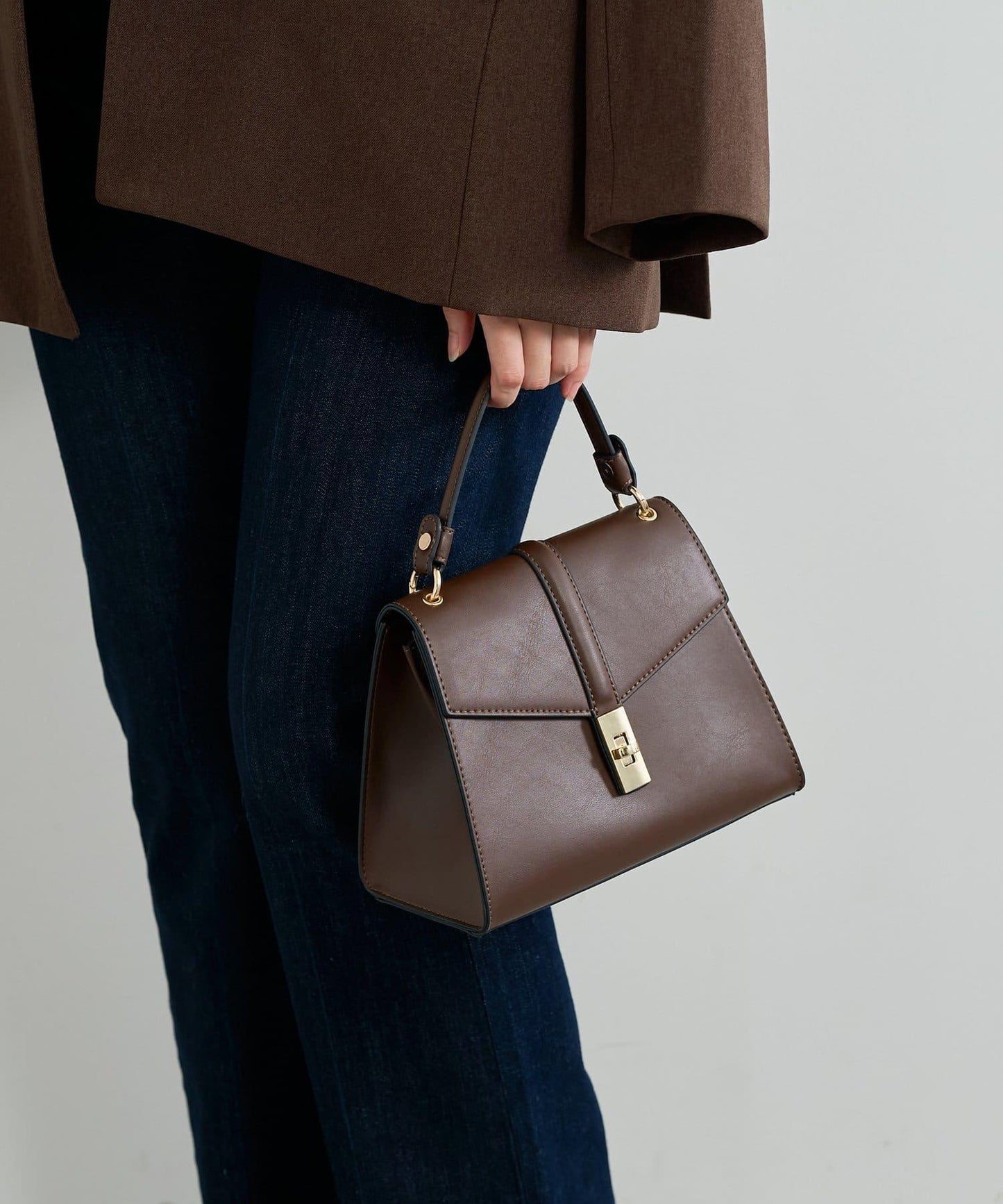 扭扣金屬單手柄波士頓包