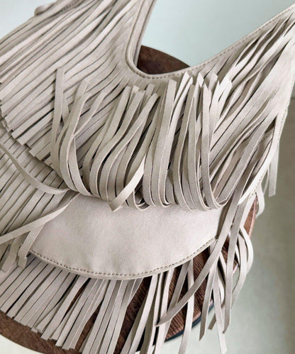 麂皮流蘇圓形包