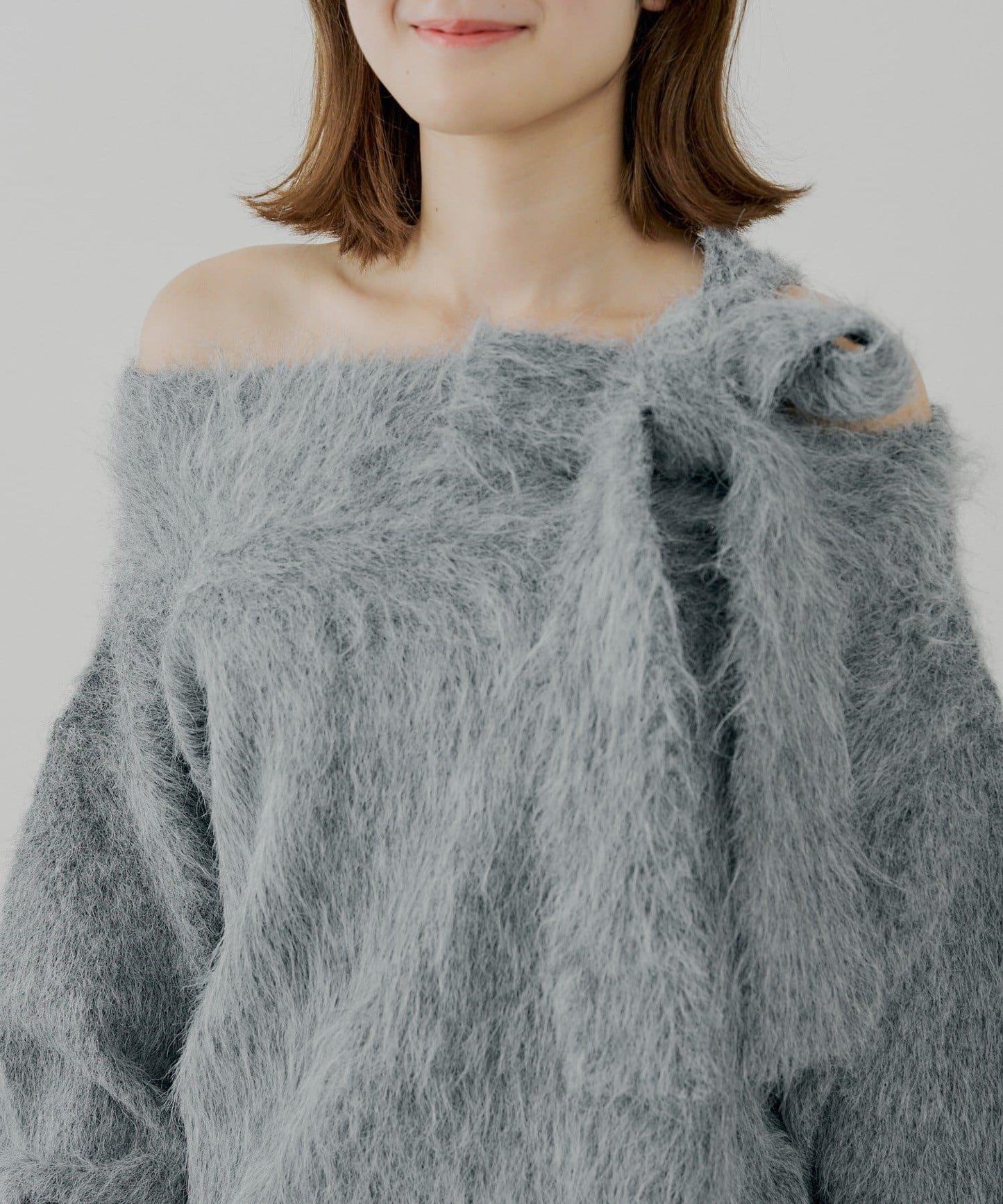 肩帶蝴蝶結露肩開衩一字領針織衫