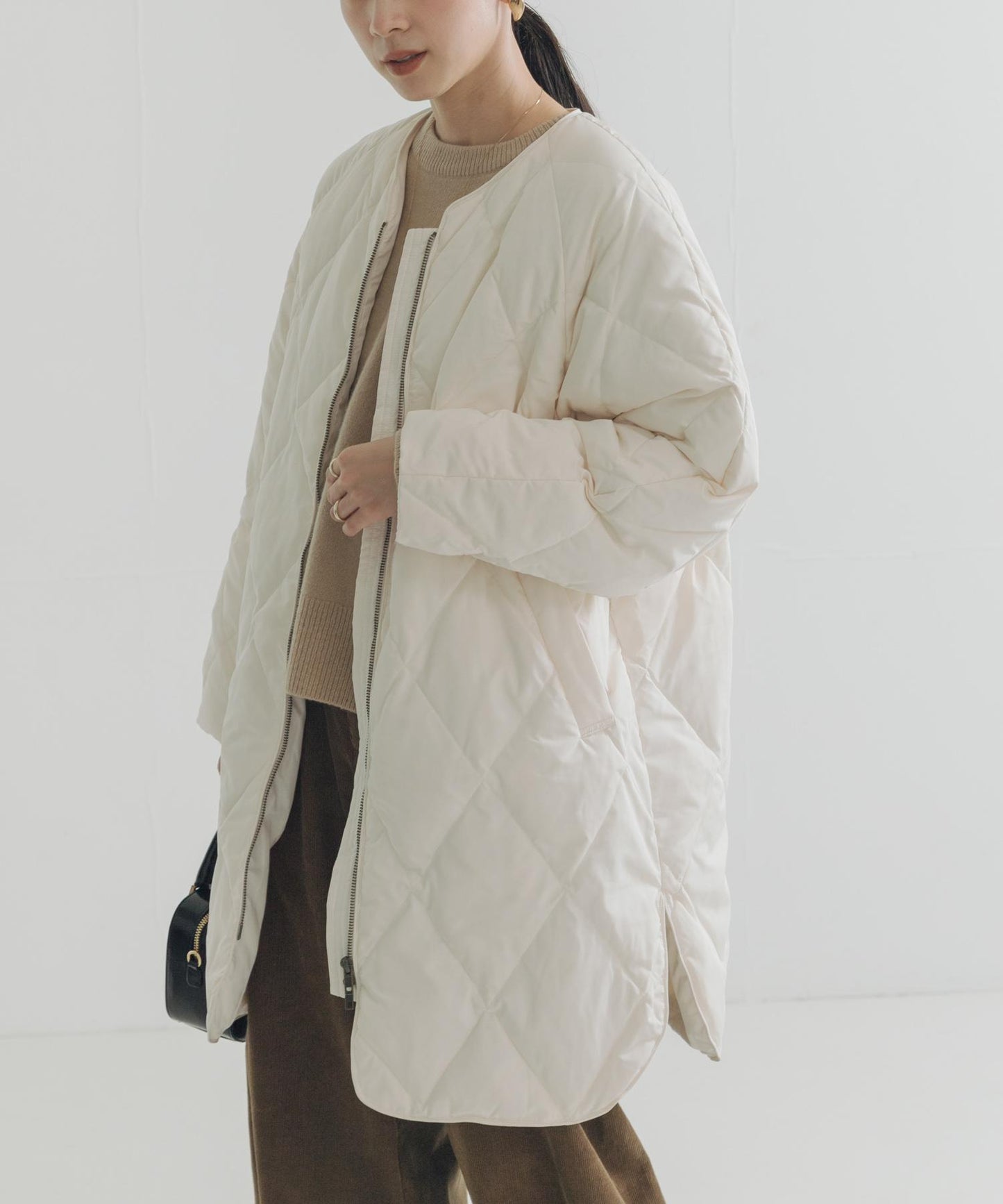 繭型絎縫長款羽絨服
