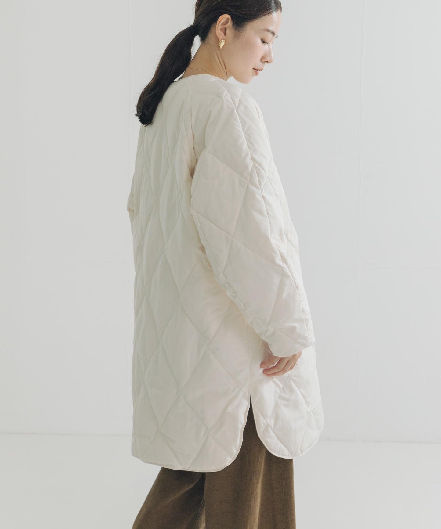 繭型絎縫長款羽絨服
