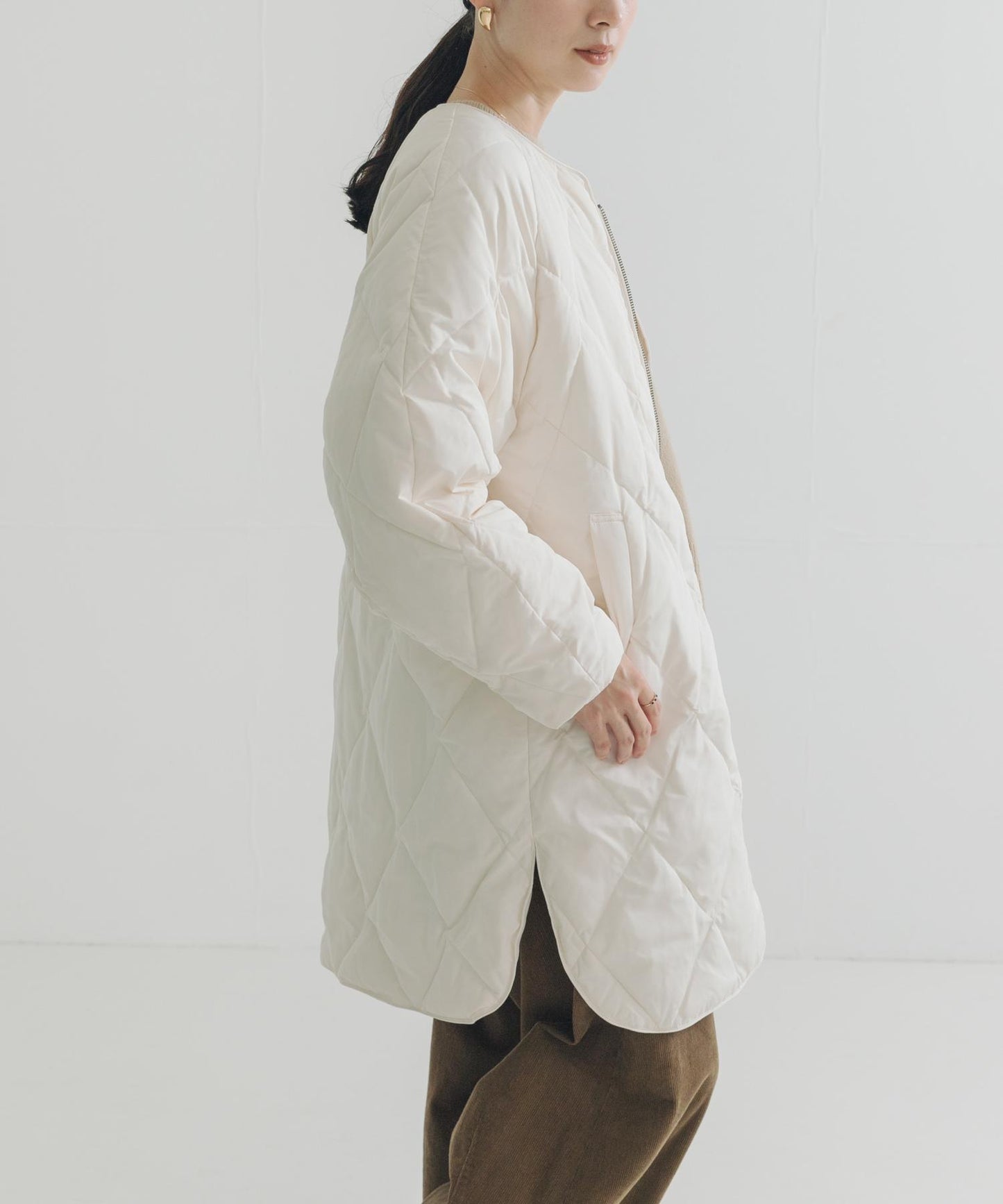 繭型絎縫長款羽絨服
