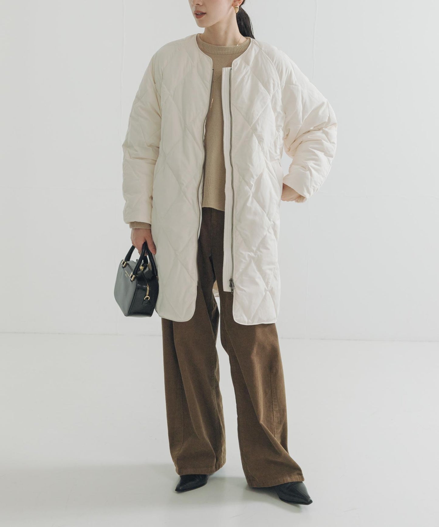 繭型絎縫長款羽絨服
