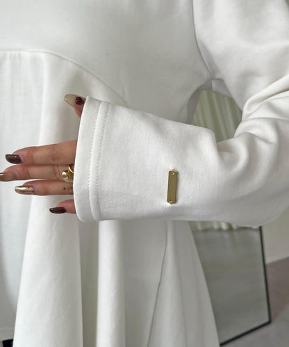 不規則下襬弧形荷葉邊長袖T恤