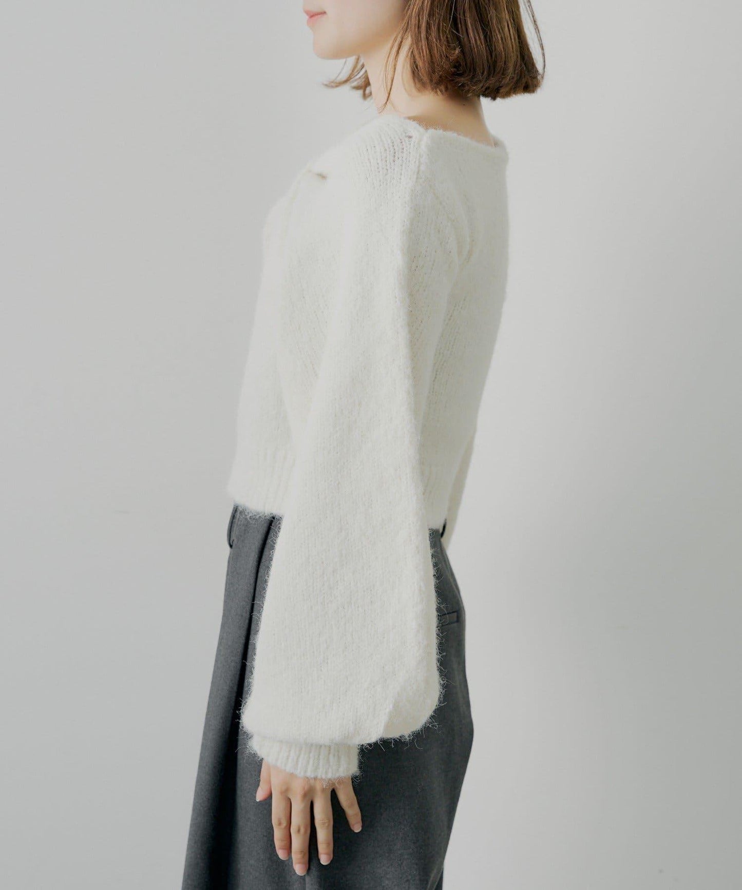 毛絨蝴蝶結設計針織衫