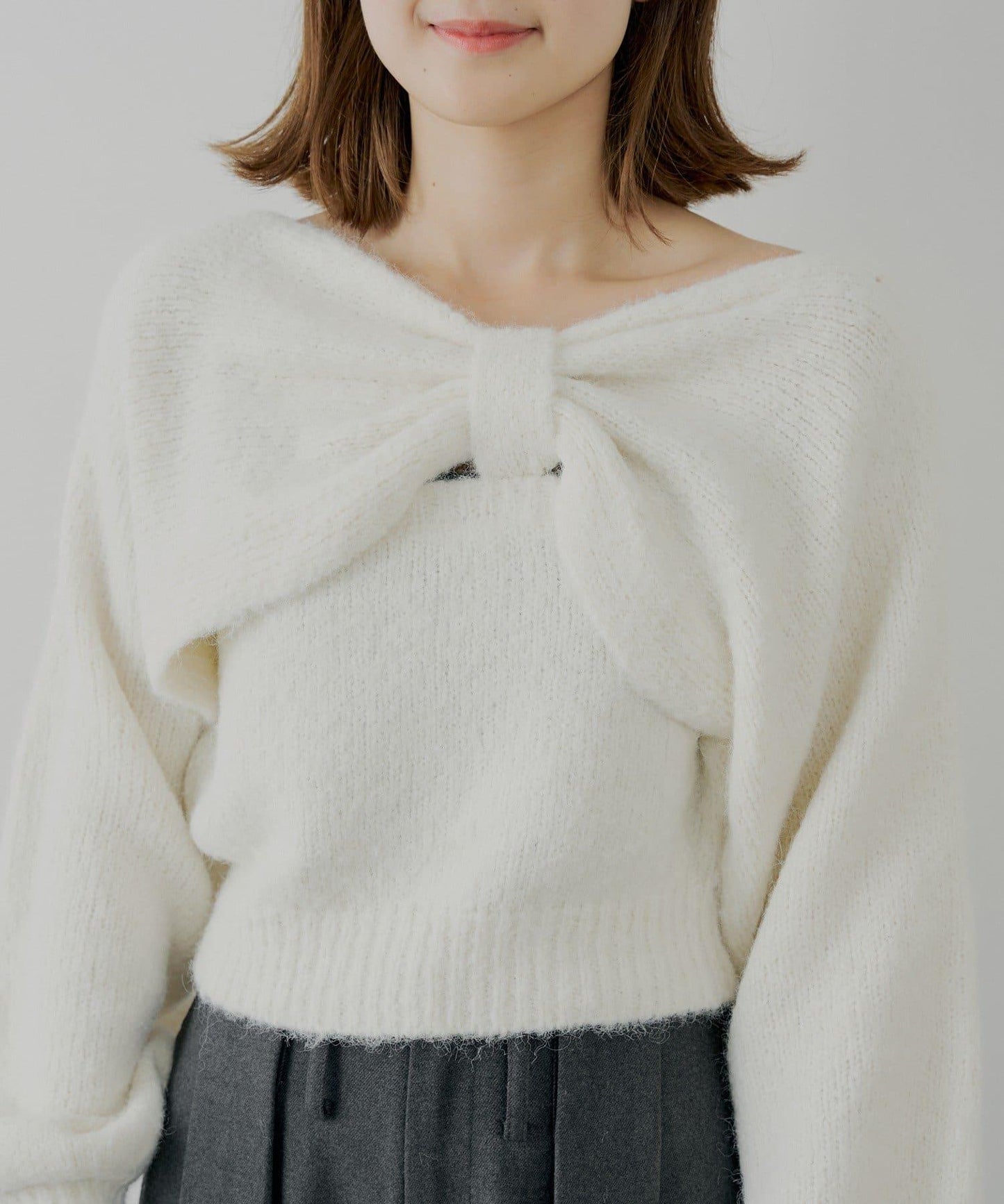 毛絨蝴蝶結設計針織衫