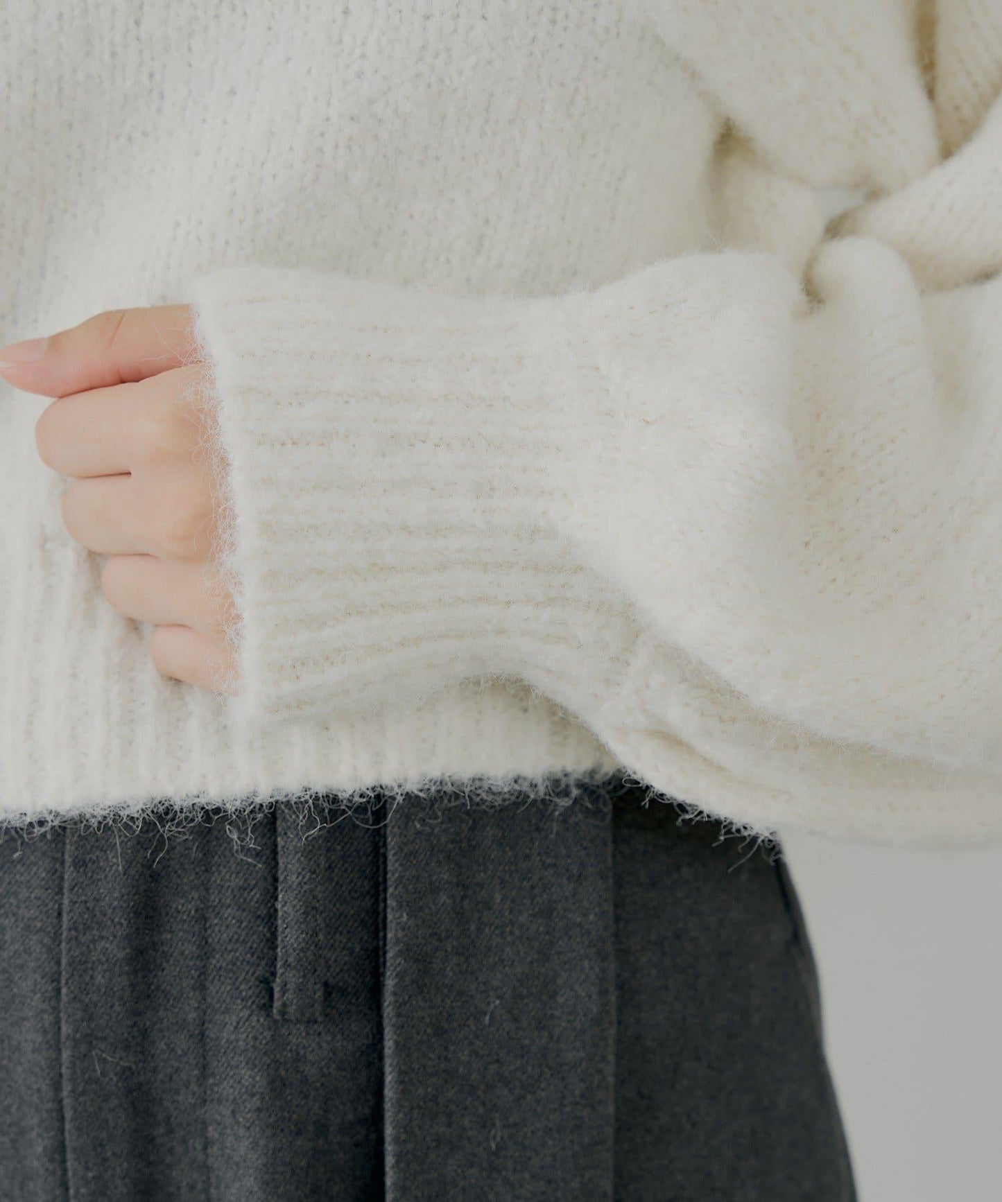 毛絨蝴蝶結設計針織衫