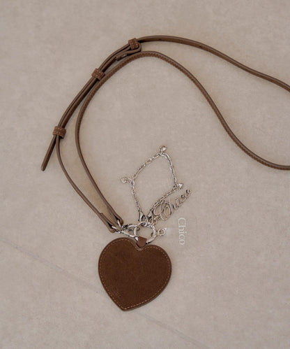 【Chico】帶愛心吊墜手機斜挎包