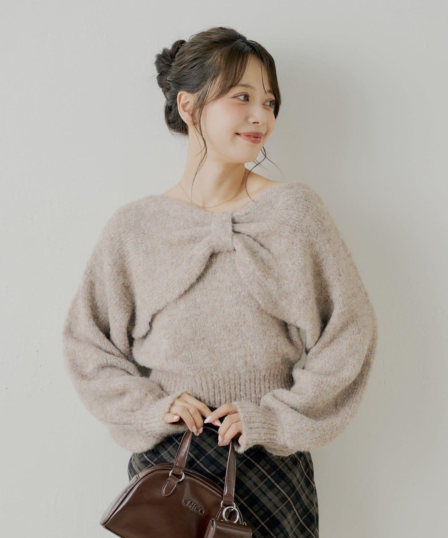 毛絨蝴蝶結設計針織衫