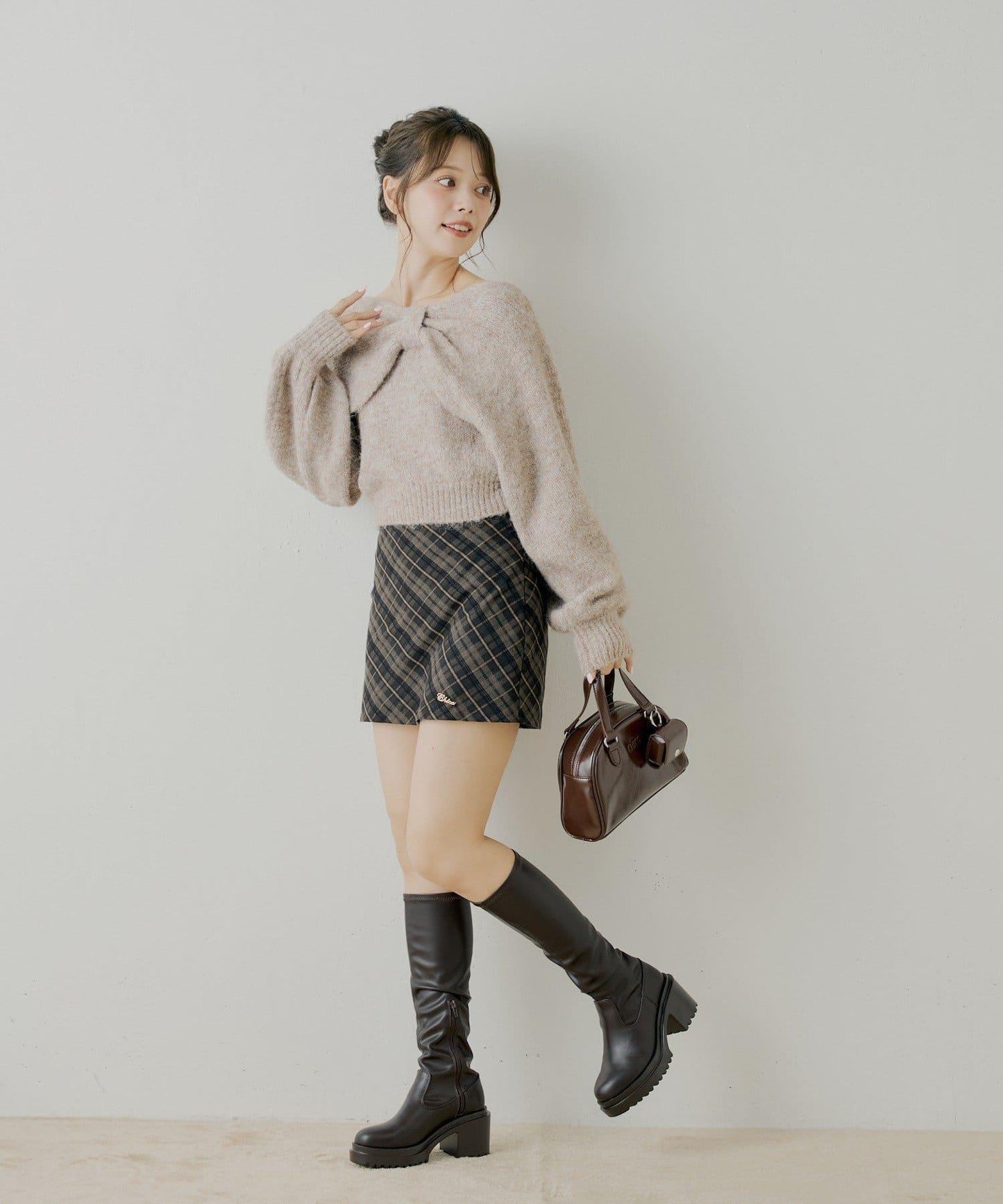 毛絨蝴蝶結設計針織衫