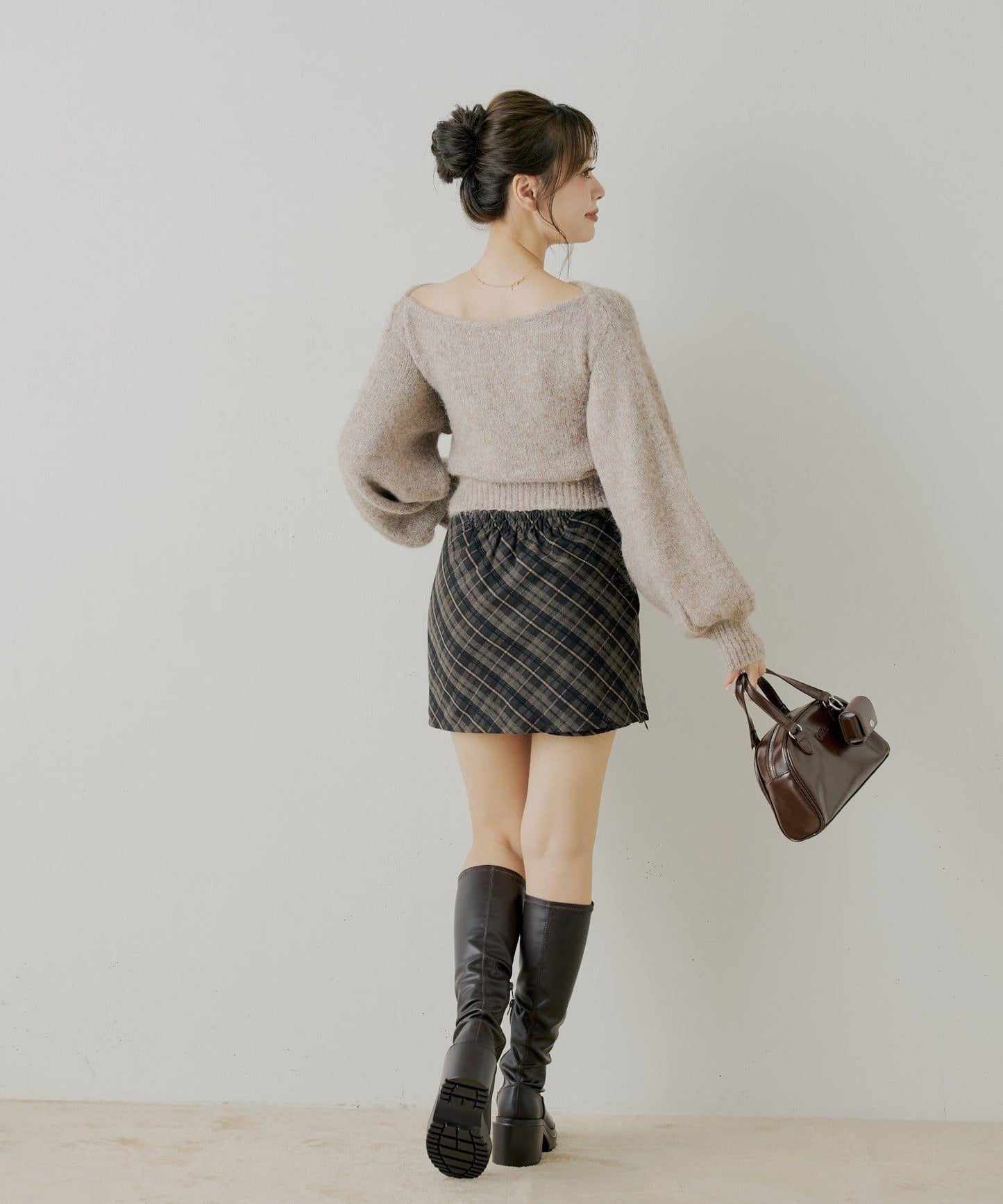 毛絨蝴蝶結設計針織衫