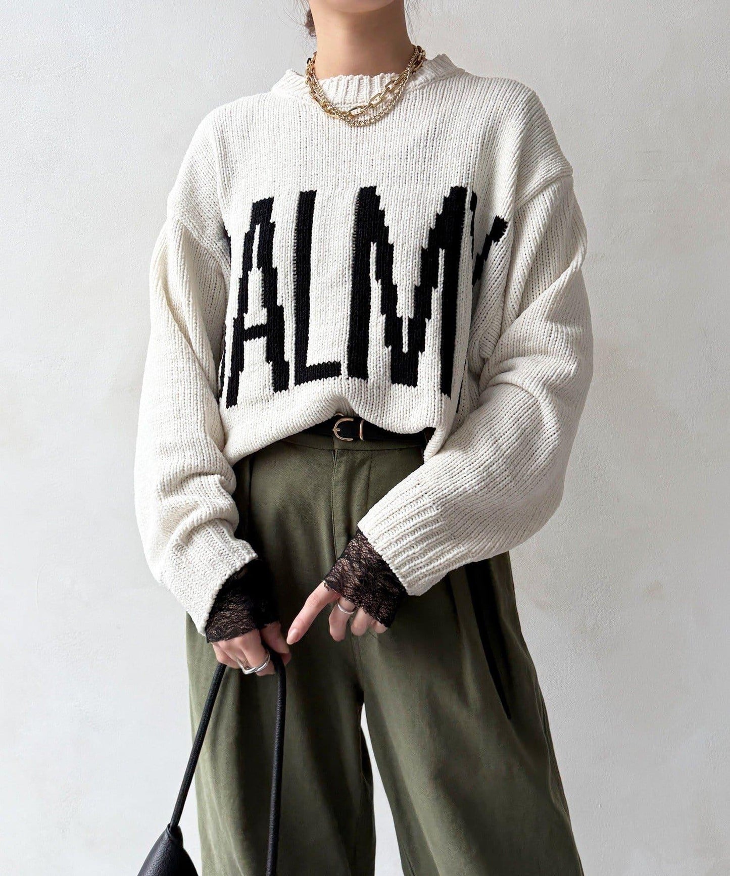 絨球標誌針織衫