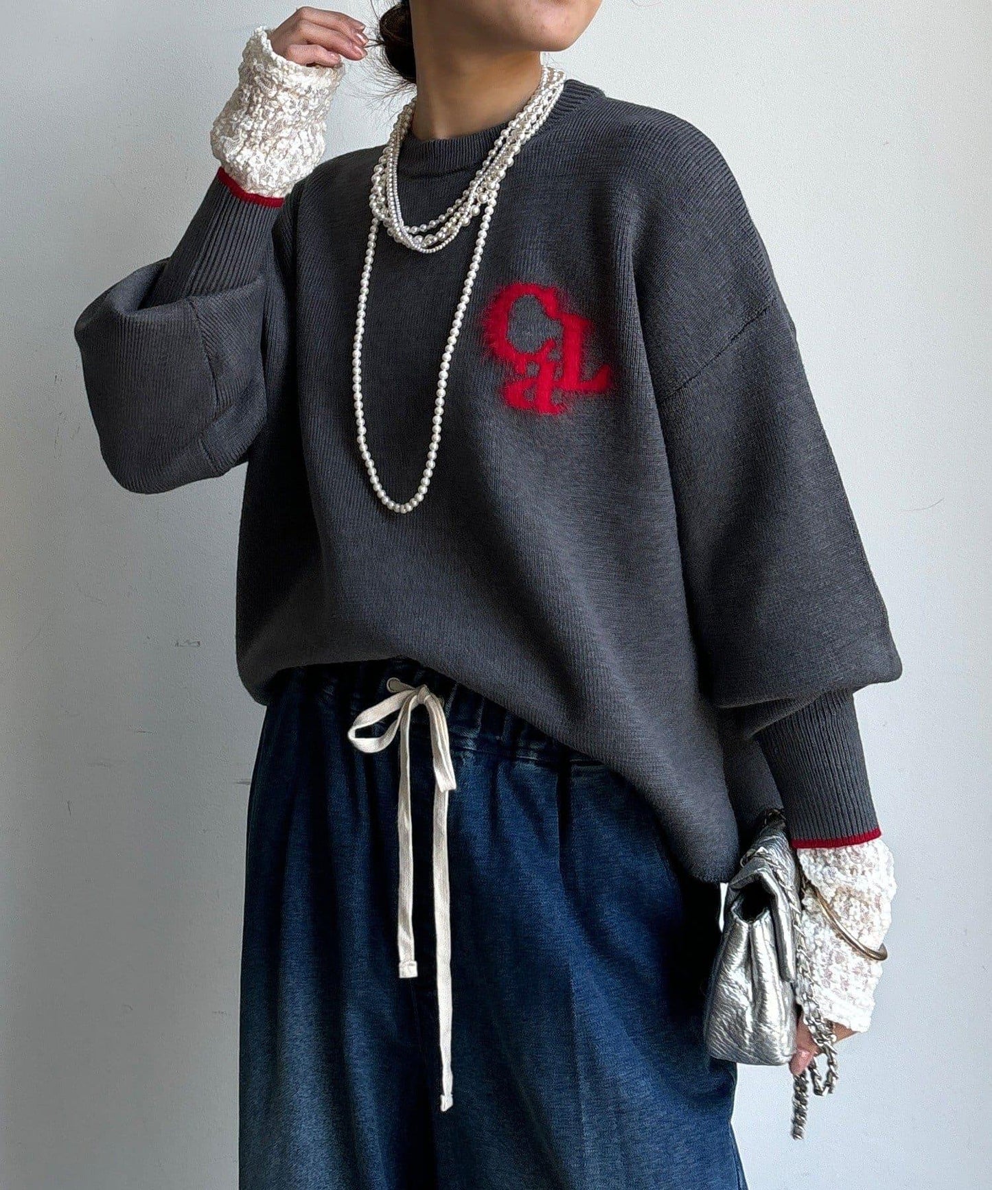 羽毛標誌針織衫