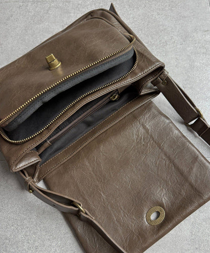 旋轉鎖雙帶皮革包