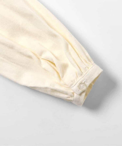 領口荷葉邊上衣