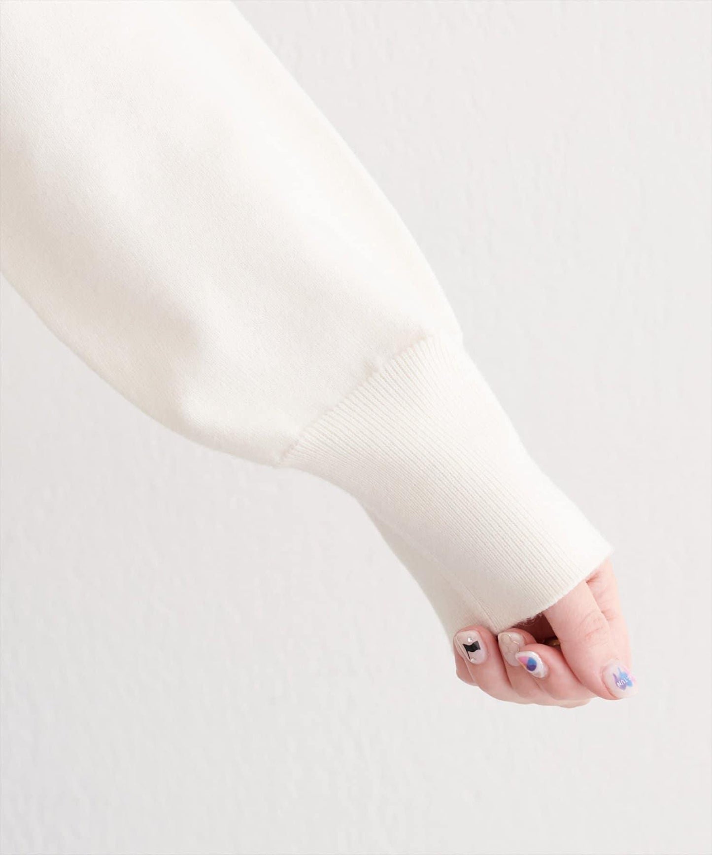 可拆卸下襬荷葉邊針織衫