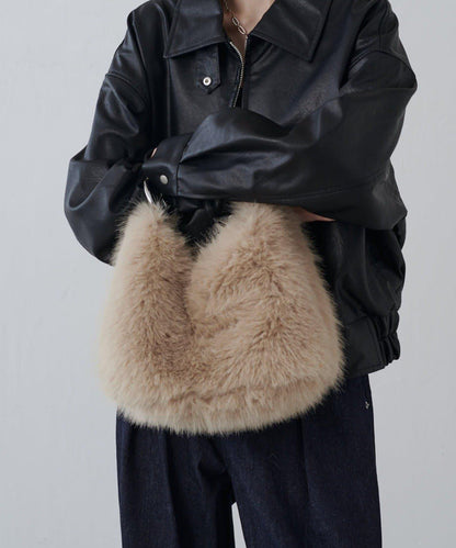 波浪扣皮革手柄毛絨揹包