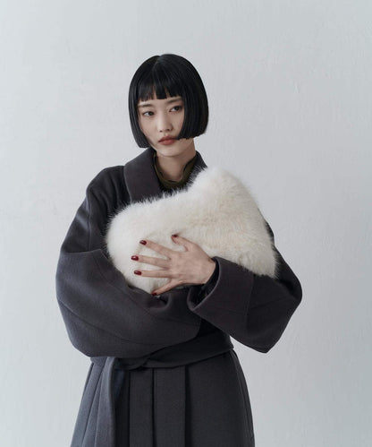 波浪扣皮革手柄毛絨揹包