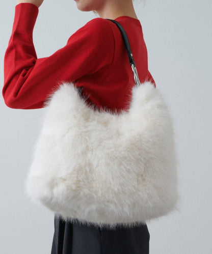 波浪扣皮革手柄毛絨揹包