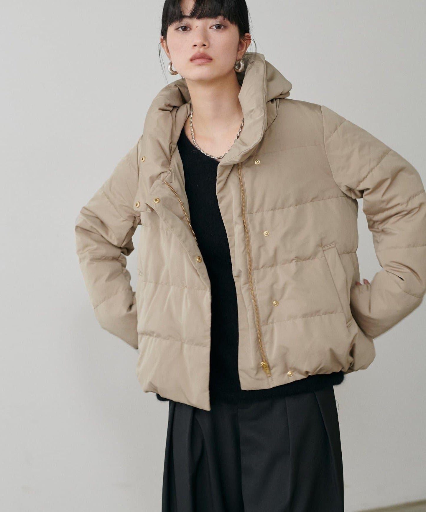 桃皮絨羽絨大衣