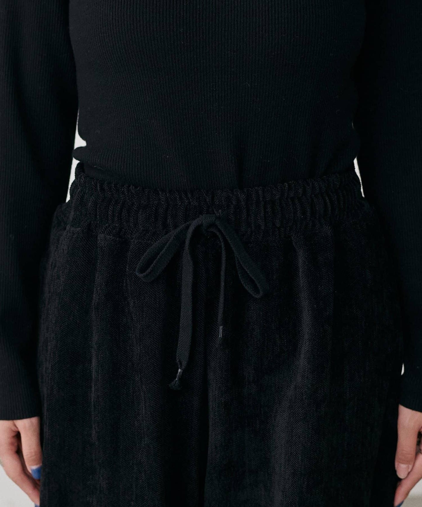 仿天鵝絨人字紋彎曲褲