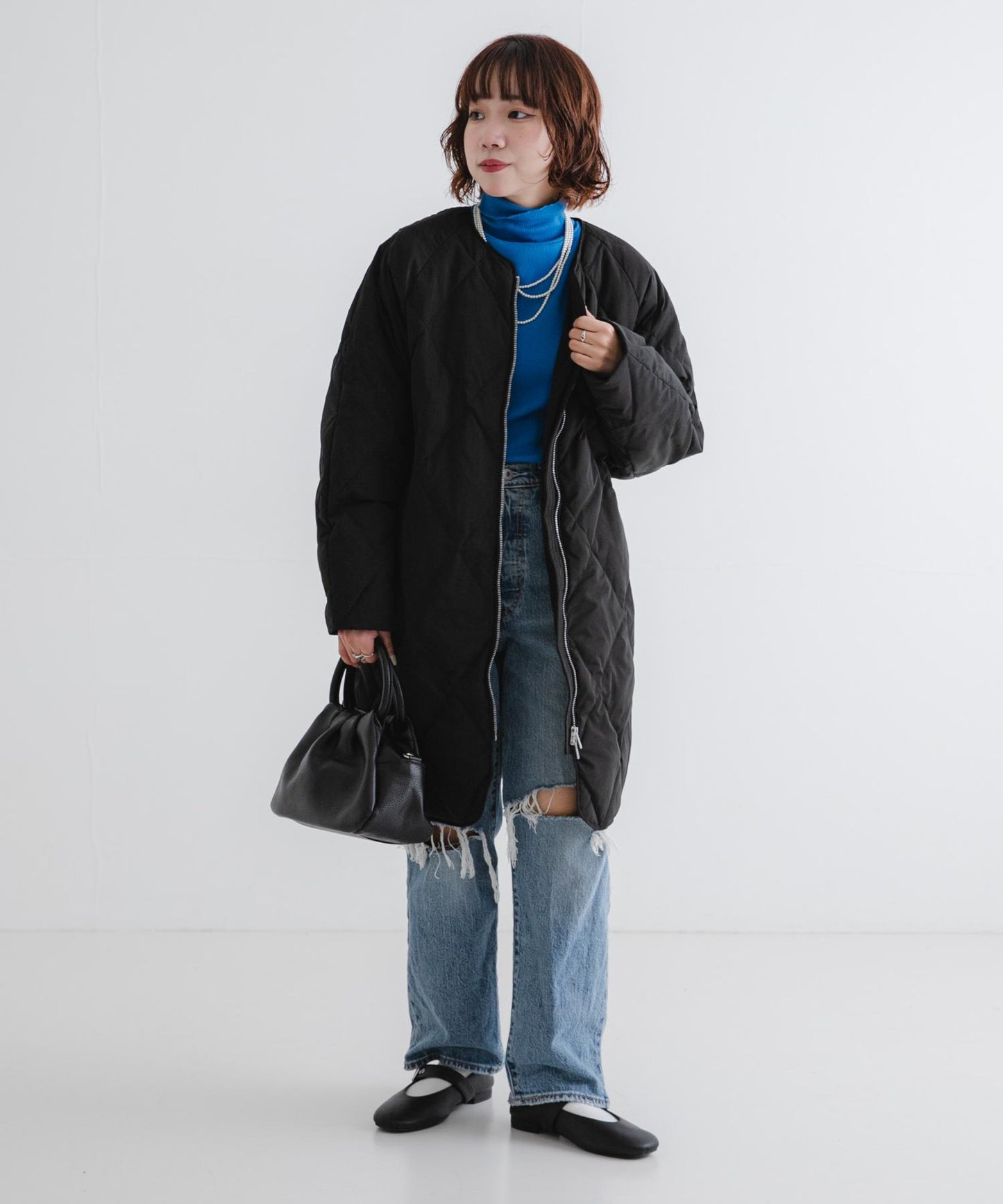 繭型絎縫長款羽絨服