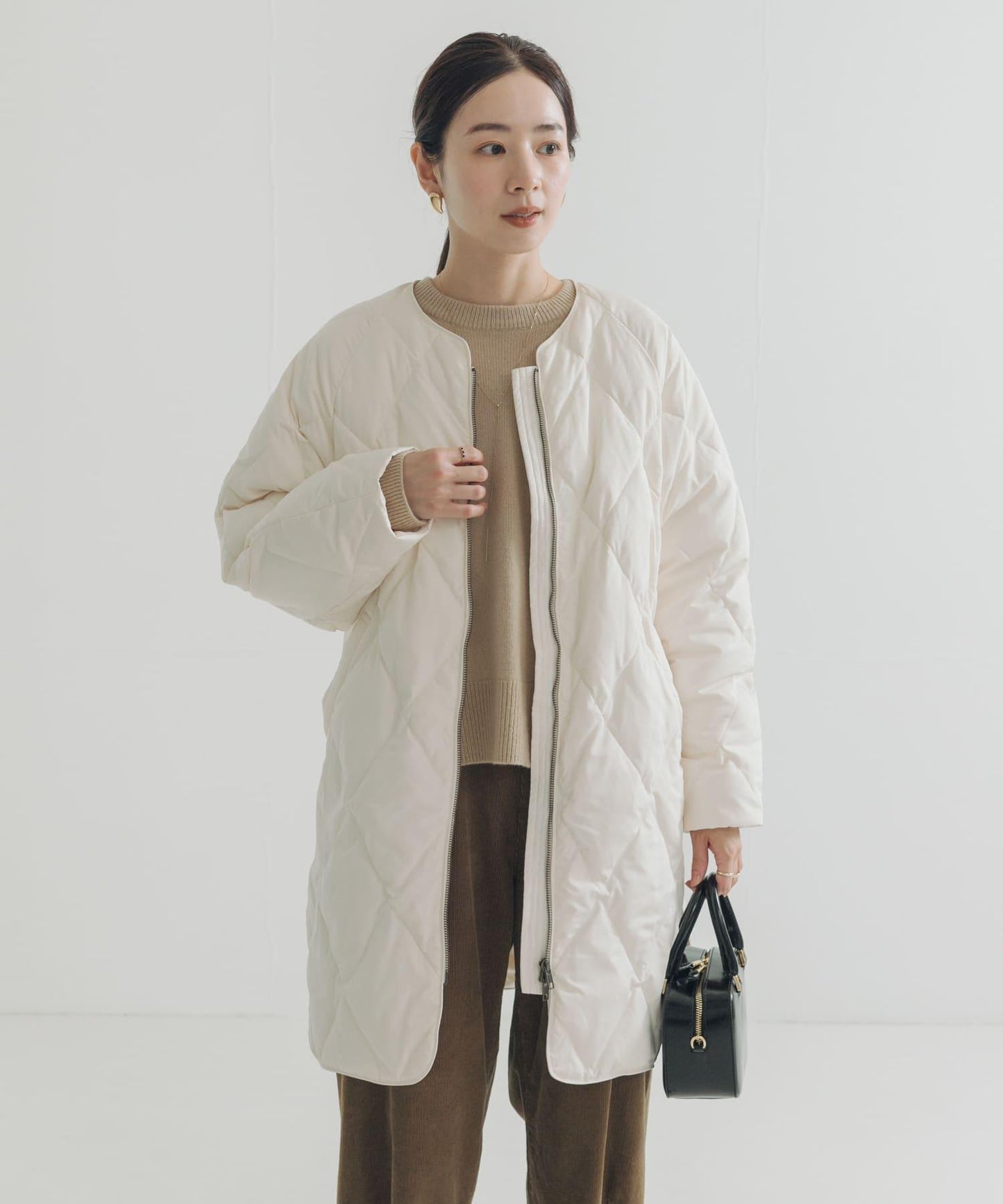 繭型絎縫長款羽絨服