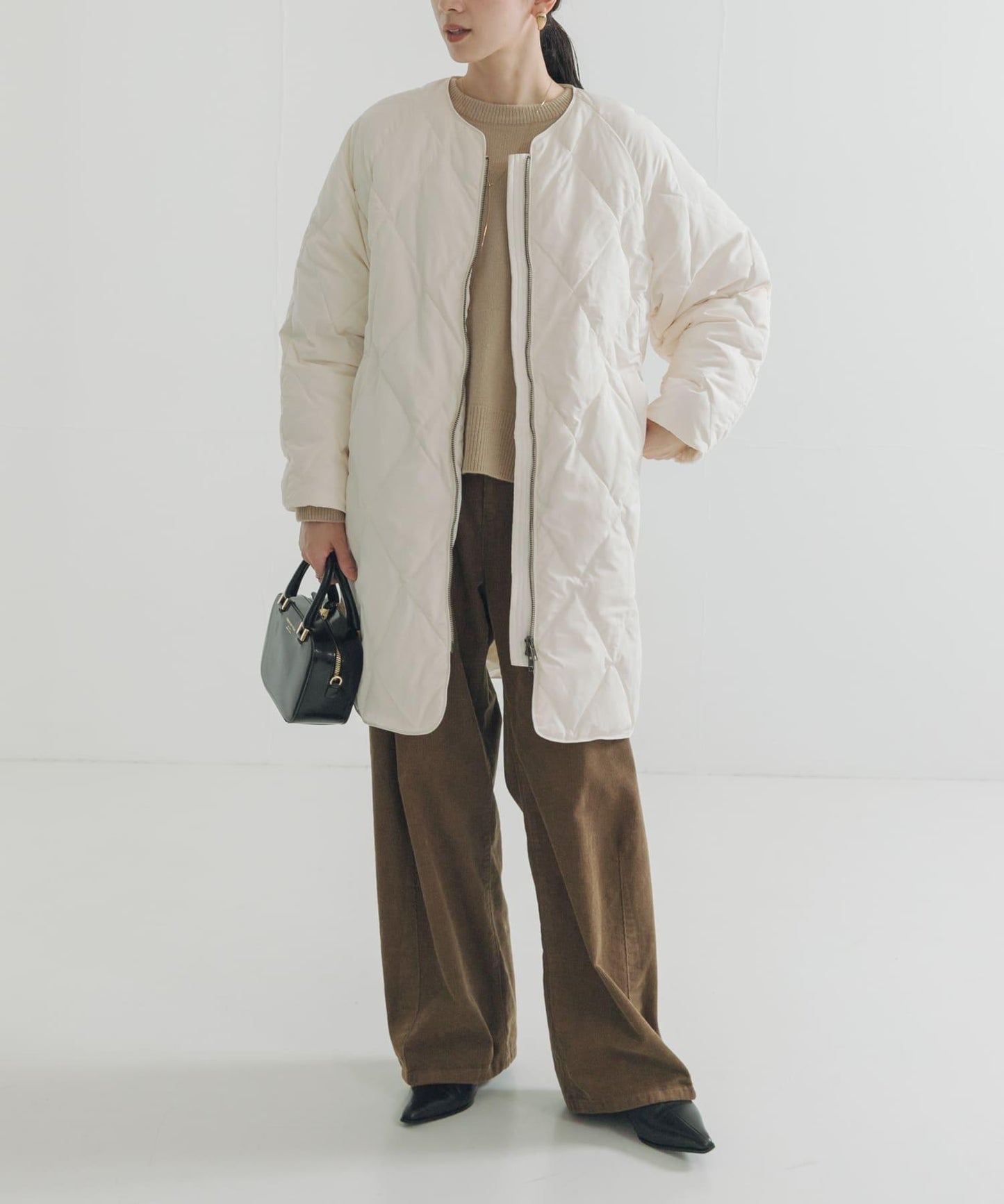 繭型絎縫長款羽絨服
