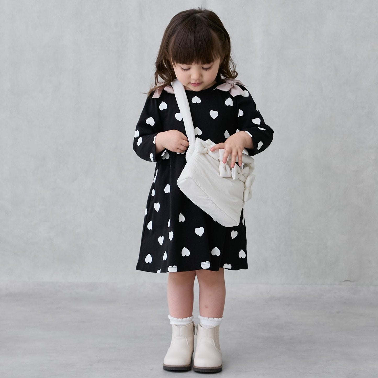 多蝴蝶結手提包