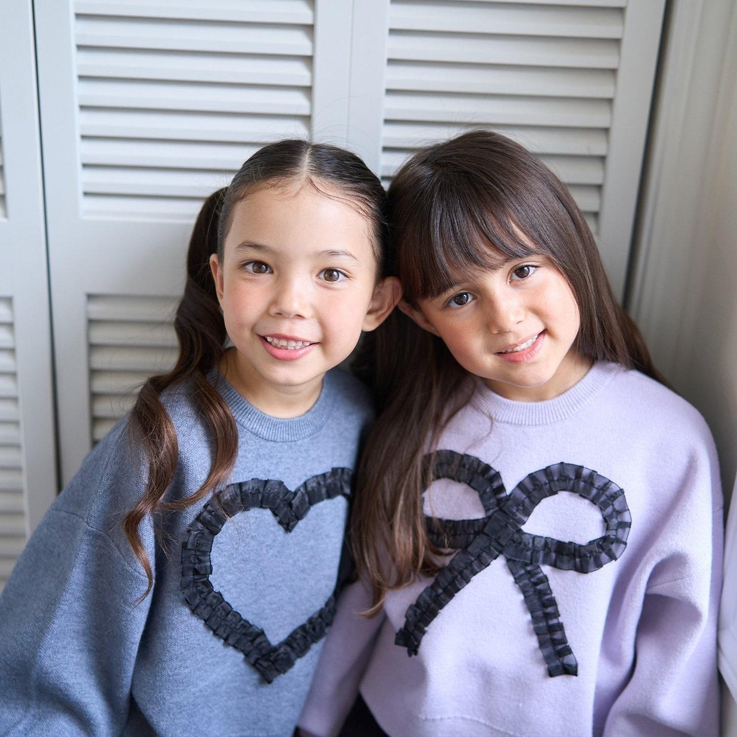 【像棉花糖般的穿著感】【可機洗】愛心蝴蝶結拼接圖案毛衣