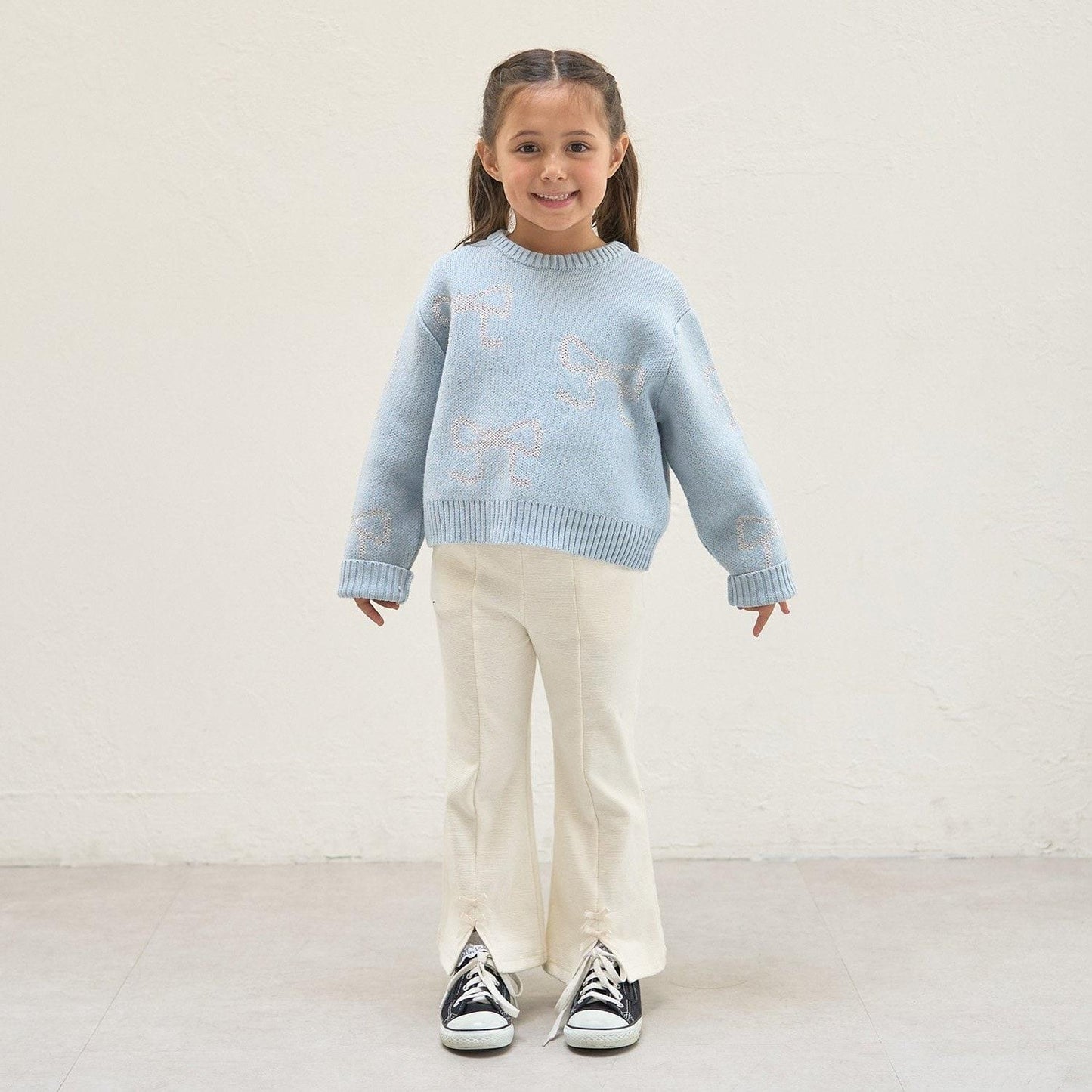 短款亮絲蝴蝶結毛衣