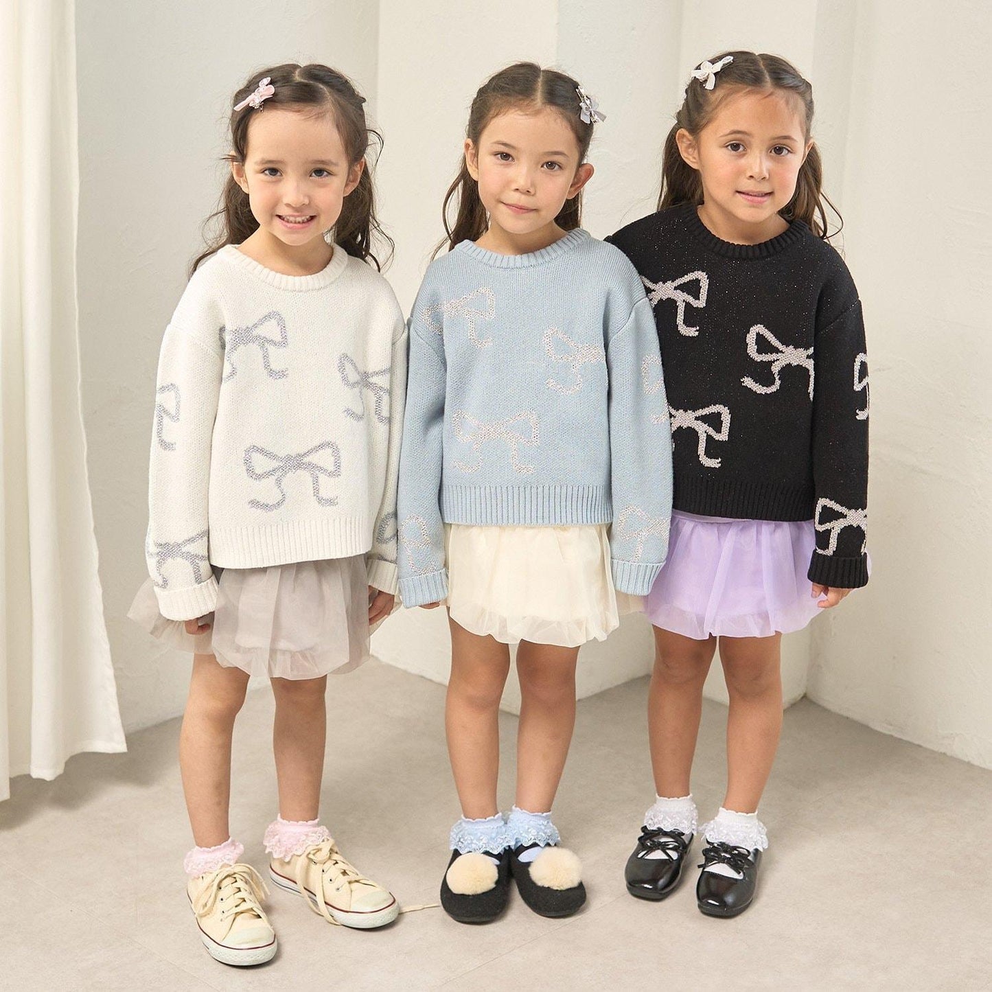 短款亮絲蝴蝶結毛衣