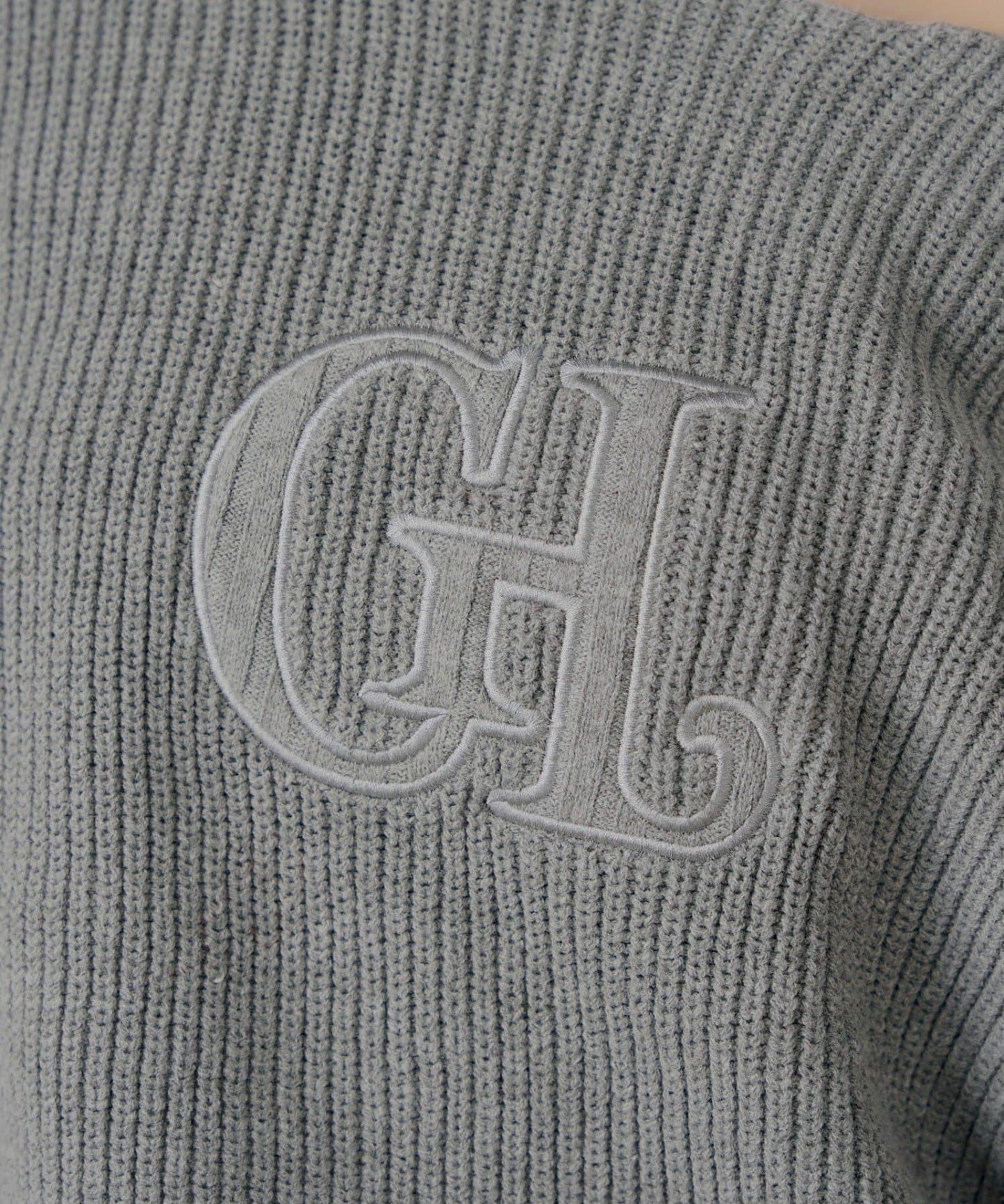 肩部開叉一字肩針織衫