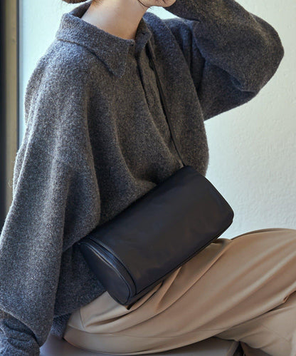 軟皮卷式單肩包